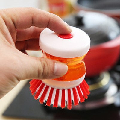 Cepillo de cocina con dispensador automático de líquido