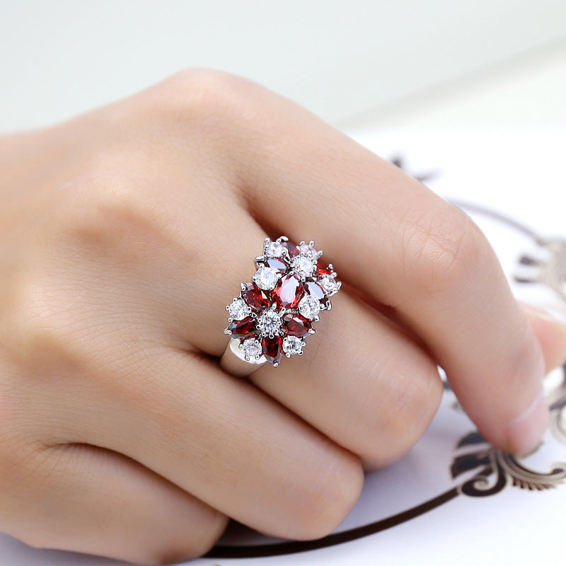 Anillo floral de circonita