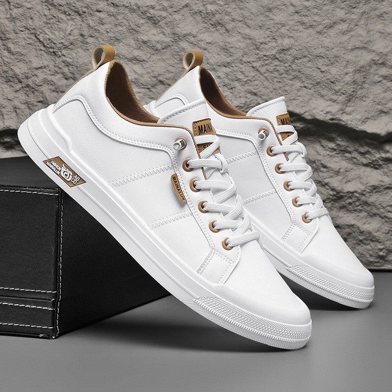 Tenis versátiles de suela blanda en blanco y negro.