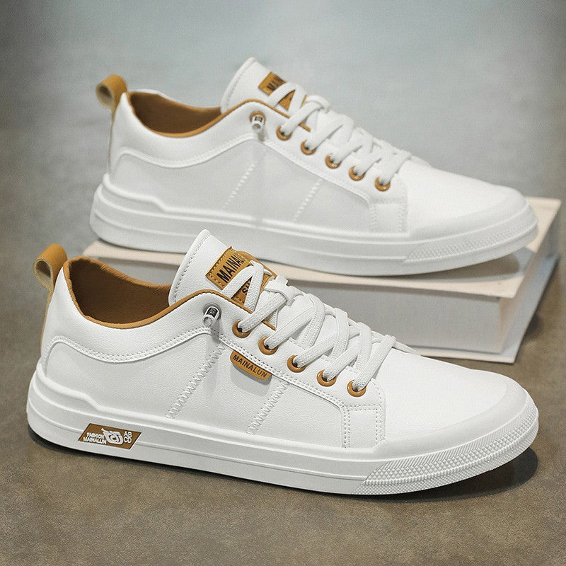 Tenis versátiles de suela blanda en blanco y negro.