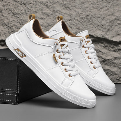 Tenis versátiles de suela blanda en blanco y negro.