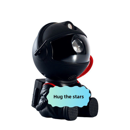 Lámpara de noche con proyección de estrellas de astronauta y control remoto.