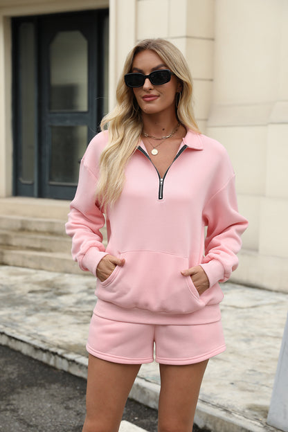 Conjunto de dos piezas para mujer pantalón corto y suéter de color liso con bolsillo.