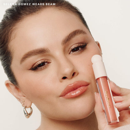 Brillo labial Rare Beauty Positive Light con destellos