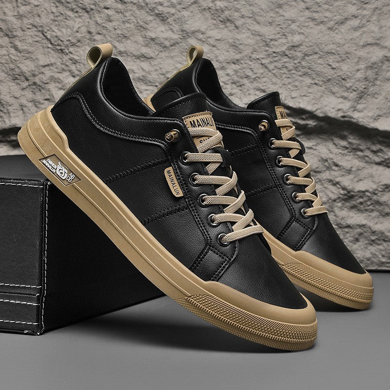 Tenis versátiles de suela blanda en blanco y negro.