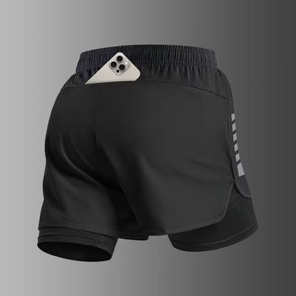 Pantalones cortos deportivos de doble capa con bolsillo para el teléfono y forro.